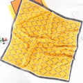 Elegant yellow silk scarf with horse carriage pattern and classic black and white border - Yellow