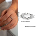 Silver stainless steel adjustable ring featuring a sequence of small connected circles - Continuous Disc Style (26) / Steel