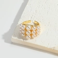 Luxurious gold adjustable ring with white pearls and sparkling rhinestones on stone base - Pearl Rhinestone Ring