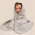 Macro detail of breathable light grey multi-layer cotton muslin fabric for baby hooded towels - Gray