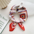 Elegant white square scarf with geometric print tied in a bow on a minimal background - Geometric Orange Red
