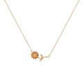 Rose gold flower pendant necklace with detailed floral and leaf design on white background - November