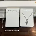 Silver heart pendant necklace with clear crystal on white Fashion Jewelry display card - 6*8.3 Leather Texture Card (approx. 100pcs)