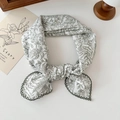 Floral cotton linen scarf in white and green featuring detailed embroidered edges - Ink Line Green