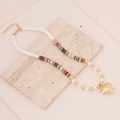 Detail of bohemian handmade clay bead necklace with pearls and gold heart pendant - Brown Mixed #6