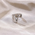Silver adjustable V-letter wide band ring on elegant champagne satin fabric background - Letter V / Silver