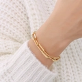Minimalist 18K gold plated paperclip chain bracelet on wrist with knit sweater background - Gold Paperclip Chain Bracelet-E306