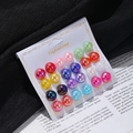 Detail view of 20 pairs colorful pearl stud earrings with metallic aurora finish on card - 12 Pairs Iridescent Round Stud Set (E1189-1)