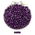 Purple cylindrical acrylic beads in a silver tray for DIY jewelry making and crafts - Deep purple