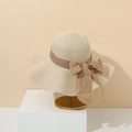 Beige wide-brimmed straw beach hat with a brown cotton ribbon and bow accent - M (56-58cm) / Beige
