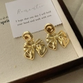 Elegant vintage style golden bow stud earrings for women with high gloss finish - Glossy Gold Bow