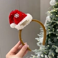 Christmas headband featuring a red sequin Santa hat with white fur and snowflake detail - Sequined Velvet Hat Headband