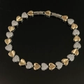 Bracciale a catena con cuori bicolore oro e argento con pavé su superficie nera - Bracciale a Cuore Bicolore SL328