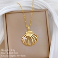 Close-up of gold shell pendant with starfish detail on white silk with size specs - Seastar Shell Necklace (P527)
