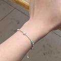 Close-up of minimalist beaded bracelet with silver star charm and colorful beads - Star-shaped Colorful Beaded (MY30134)