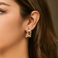 Elegant gold-wired C-shape hoop earrings with white cubic zirconia crystals on model - C-Shape Half Round Transparent Crystal Earrings