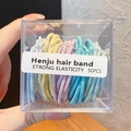 Detailed shot of 50pcs high-elastic hair ties in macaron colors and clear storage box - Spring Colors