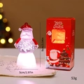 Leuchtende Weihnachtsmann-Schneekugel mit Geschenkbox für die Weihnachtsdekoration - Winkender Weihnachtsmann
