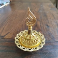 Middle Eastern golden hollow incense burner with intricate Arabic calligraphy decoration - Arabic Script