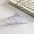 Elegant large transparent light purple shark claw hair clip on aesthetic book background - Clear
