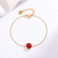 Detail of 18k gold plated stainless steel bracelet with red round faceted gemstone - Gold + Red Zirconia