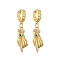 Macro detail of gold-plated palm earrings with zircon cuff and blue evil eye design - Gold/Pink Nails/Blue Eye