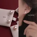 Detailed comparison of 7mm white freshwater pearl earrings on display and worn by a model - White Freshwater Pearl Studs