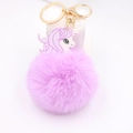 Portachiavi unicorno in peluche con pompon viola e chiusura dorata per borse e zaini - Viola Taro