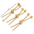 Detail of three gold plated stainless steel adjustable slider chains for DIY jewelry making - 3.5cm / Gold