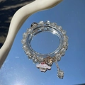 Elegant beaded bracelet with clear crystals and a small fairy pendant on a mirror surface - S020-white Doll Cinnamon Dog Bursting Flower Bracelet #sz529