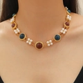 Vintage gold necklace set with pearls and blue gemstones worn by a fashion model - Vintage Artificial Pearl & Colorful Gemstone Necklace (Imitation Gold M-673)