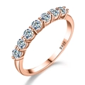 Detail shot of rose gold S925 silver ring featuring eight sparkling round moissanite stones - US 5 / Rose Gold with White Moissanite