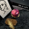 Aromatherapy scented candle in a red and pink fluid art tin with a wooden base stand - H06 Rose