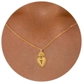 Close-up of elegant gold heart-shaped pendant necklace worn on neck detail - Heart Necklace 2