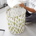 Collapsible canvas laundry basket with green tree print and dual carry handles - Christmas Tree