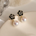 Detail shot of black enamel camellia earrings with pavé diamonds and a lustrous pearl drop - 14# Micro-set Camellia Pearl Earrings