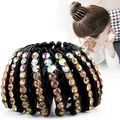 Close-up of sparkling champagne rhinestones on a velvet nest hair clip for bun styling - Rhinestone Khaki