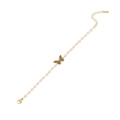 Collana con perle dorate e ciondolo a farfalla in smalto blu su sfondo bianco puro - Bracciale di Perle Farfalla (2# Bracciale)