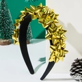 Serre-tête de Noël avec nœuds dorés étincelants sur un fond de décorations festives - Jaune