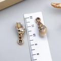 Pair of gold-plated natural conch shell pendants with top loops and 3cm size measurement - Electroplated Gold Cream Acrylic Conch 24x10x9mm (23617)