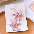 Pair of pink glittery snowflake hair clips with rhinestones on a display card - Full-wrapped Pressure Clip / Pink