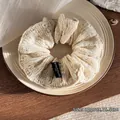 Beige knitted scrunchie with crochet texture and brand label, 15.5cm diameter accessory - Diameter approx. 15.5cm / Off White