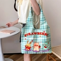 Green checkered canvas tote bag featuring strawberry print and cute cartoon animals - Green Gingham Strawberry