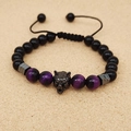 Detailed view of adjustable beaded bracelet with black wolf head charm and purple beads - Type C Obsidian + Purple Tiger Eye