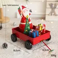 Père Noël en chariot rouge avec sapin de Noël et lumières LED, fonctionne avec piles AAA - Voiture de Père Noël à Cadeaux Rouge