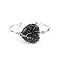 Detail of silver wire-wrapped heart-shaped black stone bracelet with tree of life motif - Natural / Obsidian