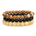 Detailed macro view of stacked 8mm natural stone beads including black onyx and agate - Picture Stone and Topaz