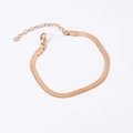 Flat lay of rose gold snake bone chain bracelet with lobster clasp and extender chain - 2.5mmx16+5cm / Rose Gold