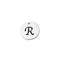 Macro view of mirror polished stainless steel round charm with engraved letter R - Letter R