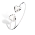 Polished silver heart open cuff bracelet featuring dual 3D heart motifs on white background - White Gold